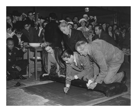 Loretta Young at Grauman's Chinese Theater with Sid Grauman and Tyrone Power