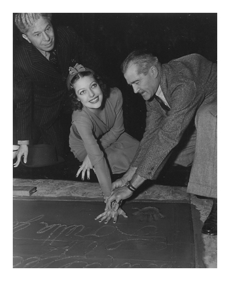 Loretta Young Puts Her Hand Prints in Concrete at Grauman's Chinese Theater